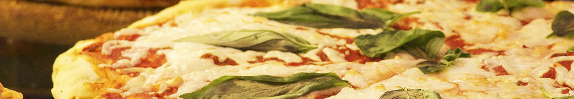 Eating Italian Pizza at DiFrancos Restaurant restaurant in Litchfield, CT.